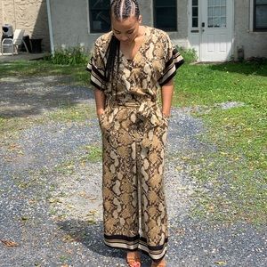 H&M snakeskin belted jumpsuit.